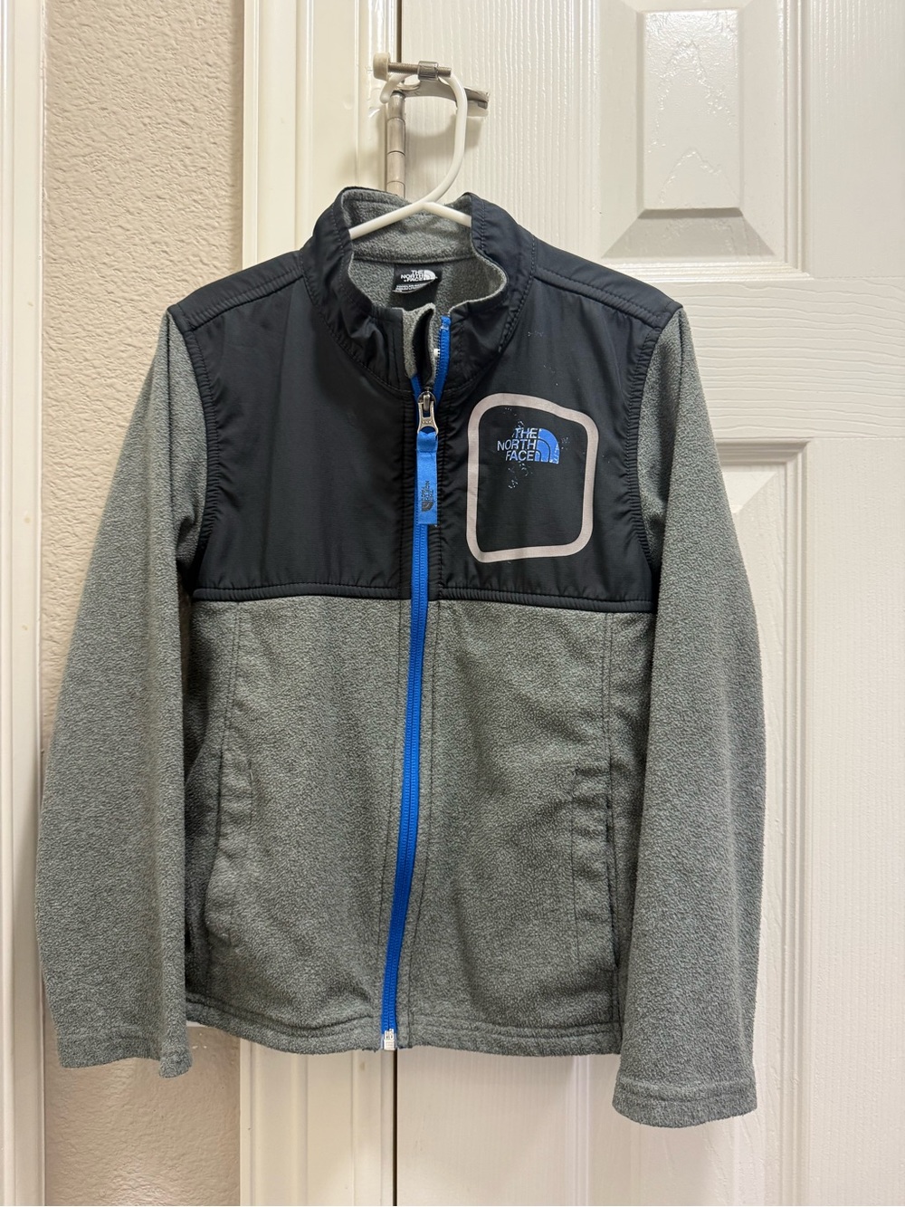 The North Face Grey Fleece Jacket with Black Yoke and Blue Zipper